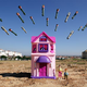 Illustration for article titled Photographs of toys recreate childrens perspectives of war